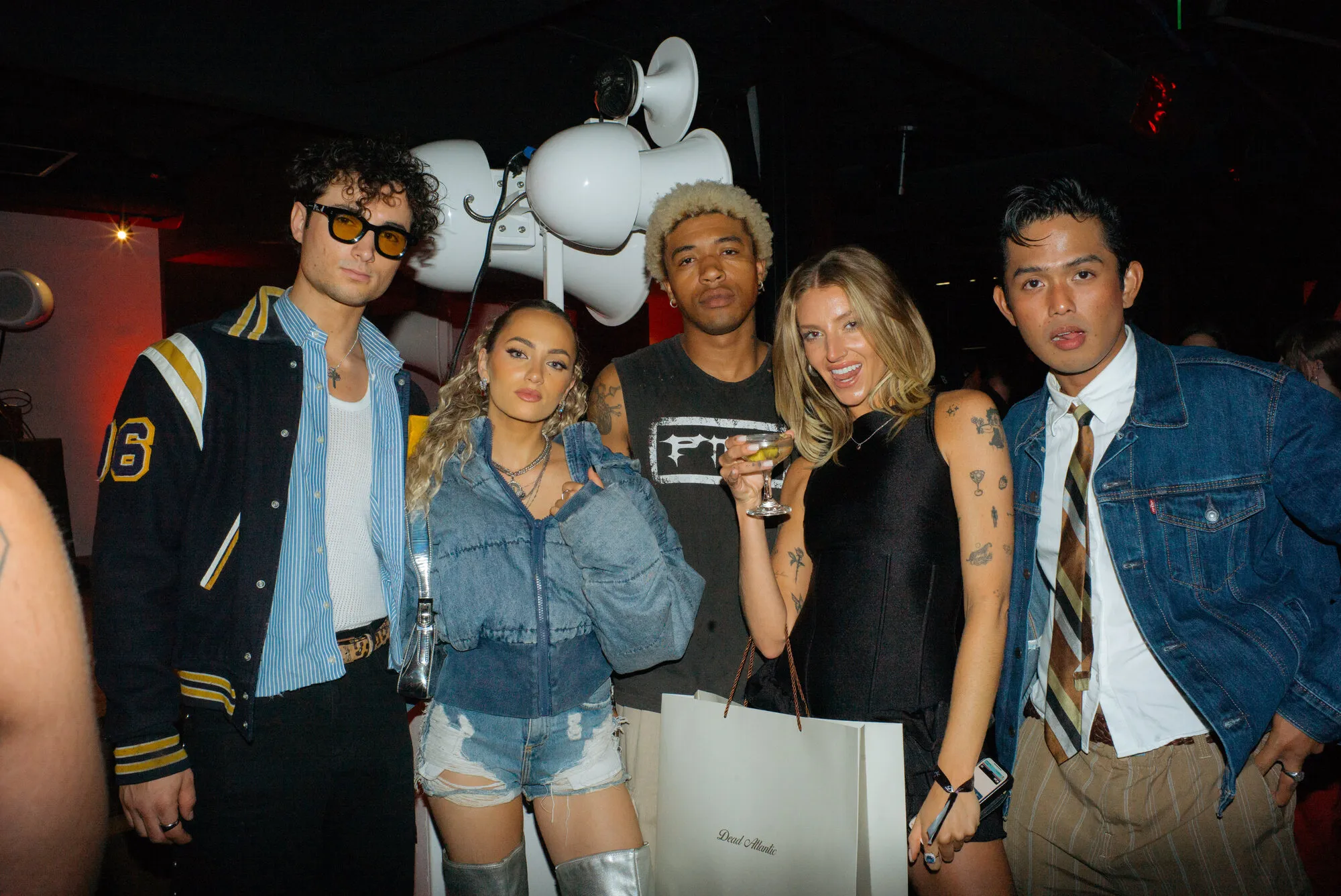 Guests posing in front of Void speakers
