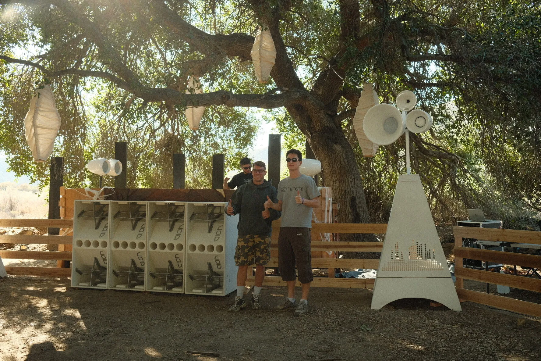 Luke and Jakob, founders of Bobby Jon Sound, in front of their Void Acoustics stage at The Woods, YOON Fest